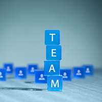 Blue cubes spelling out TEAM